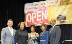 Evelyn Receiving Small Business Champion Award DC Chamber_6.8.16_500p